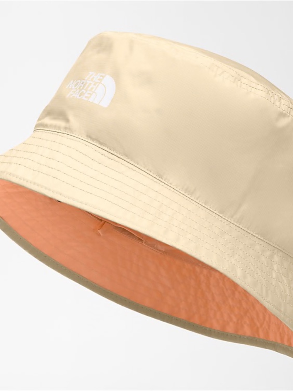 NWOT The North Face Reversible Bucket Hat in Beige and peach